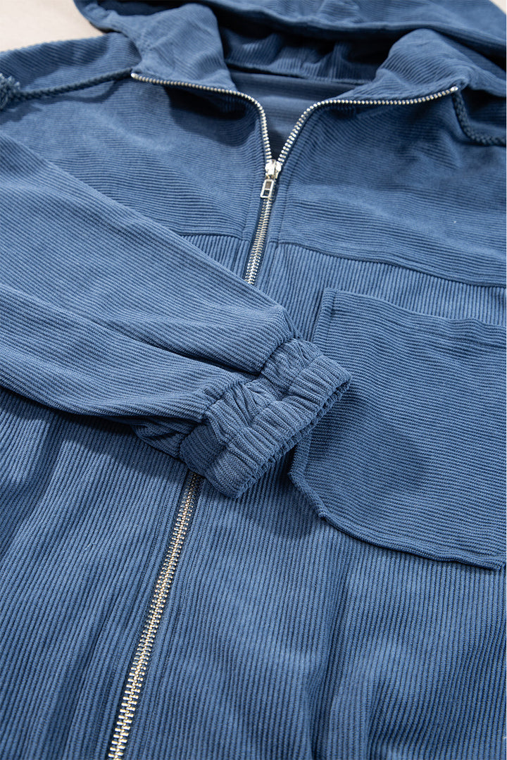 Blaugrüne Cordjacke mit Kapuze und Kordelzug