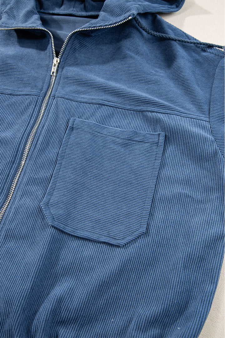 Blaugrüne Cordjacke mit Kapuze und Kordelzug