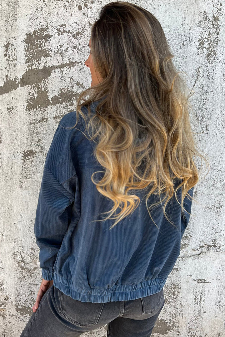 Blaugrüne Cordjacke mit Kapuze und Kordelzug