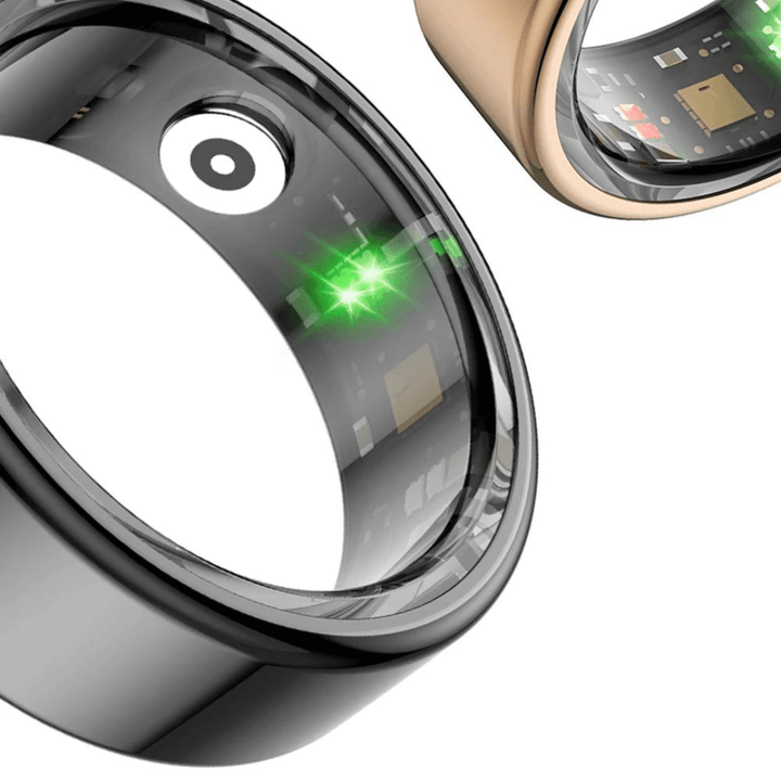 Schwarzer und goldener Smart-Ring mit Sensoren, Gesundheitsüberwachung, modernes Design.