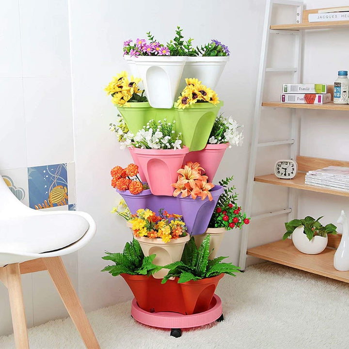 "6-Etagen vertikaler Pflanzturm für Blumen und Kräuter, platzsparend, modernes Design, ideal für kleine Gärten."