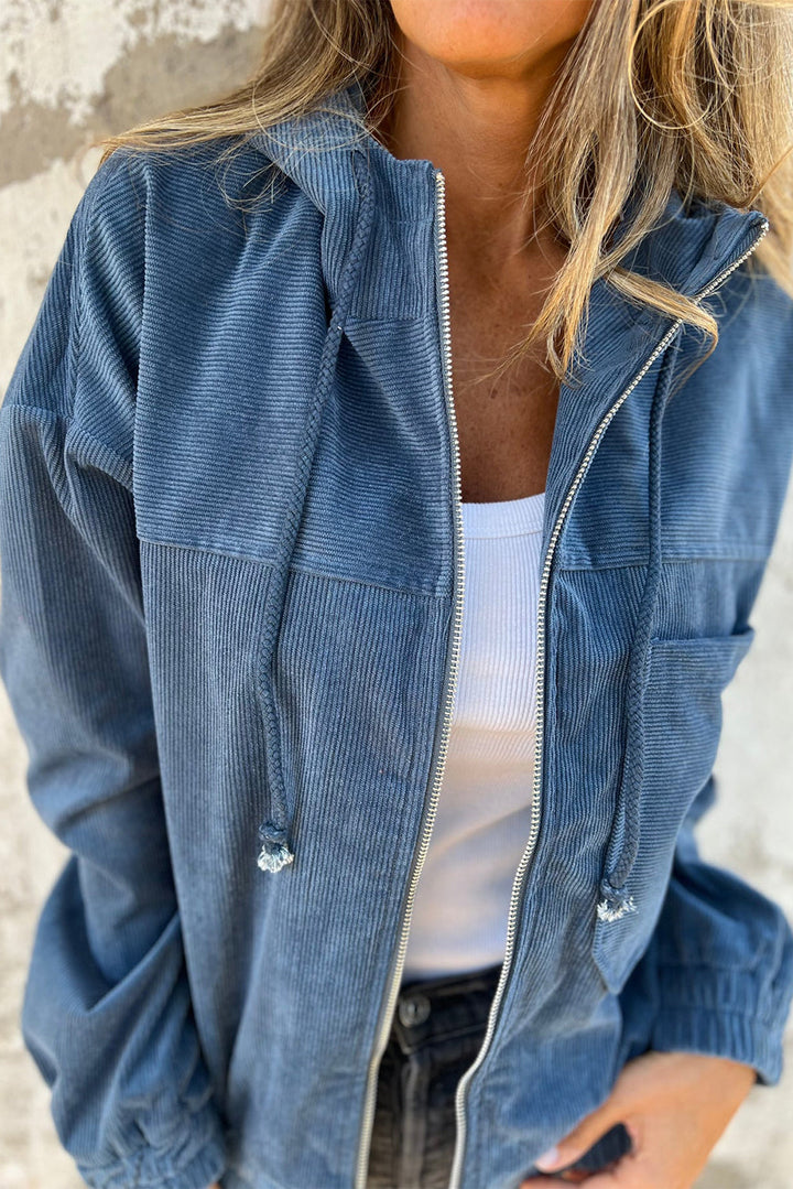 Blaugrüne Cordjacke mit Kapuze und Kordelzug
