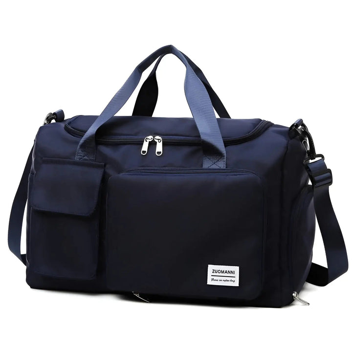 Dunkelblaue Reisetasche mit Schultergurt, Reißverschlusstaschen, ideal für Reisen und Sport.