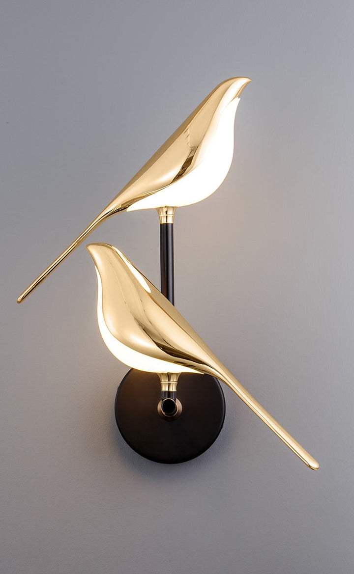 Moderne Vogel-Wandleuchte aus Gold für elegantes Ambiente