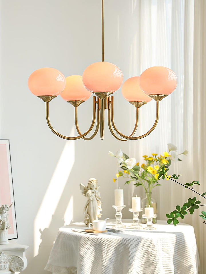Stilvolle Kronleuchter mit Rosa Glasschirmen für Innenräume