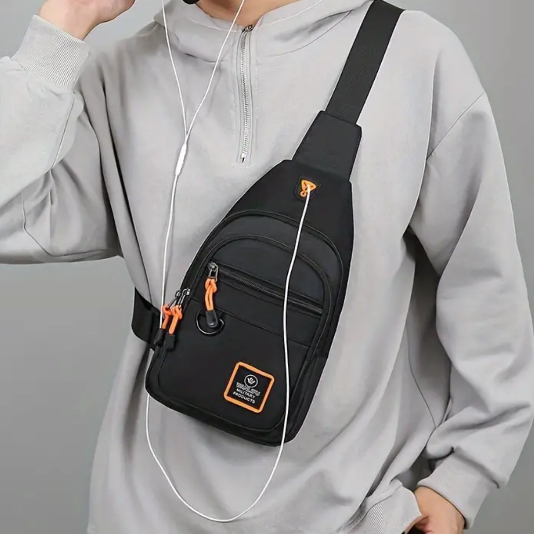 Schwarze Umhängetasche mit orangefarbenen Details, ideal für Reisen und Freizeit.