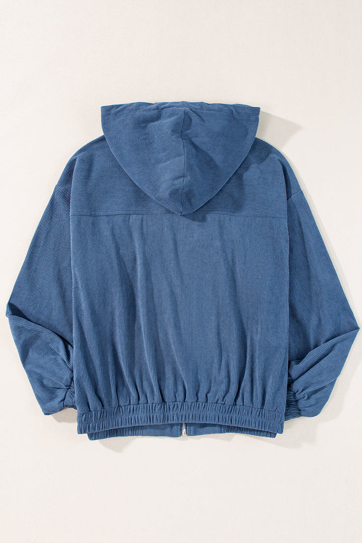 Blaugrüne Cordjacke mit Kapuze und Kordelzug