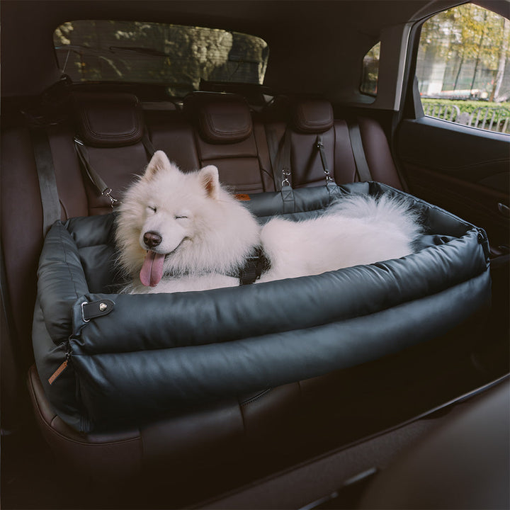 "Autositz Hundebett aus Kunstleder, dick gepolstert, in Grau, mit integrierter Leine für sicheren Hundetransport."