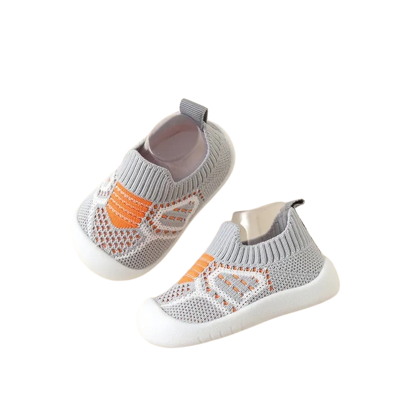 Bequeme, atmungsaktive Babyschuhe in verschiedenen Farben, mit rutschfester flexibler Sohle für kleine Entdecker.