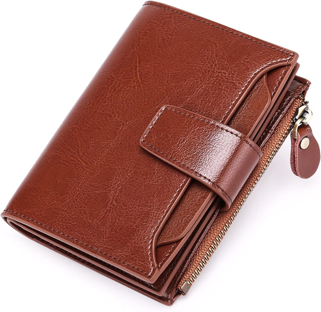 Braune Leder-Geldbörse mit Reißverschluss und Druckknopf, stilvoll und kompakt für Damen.