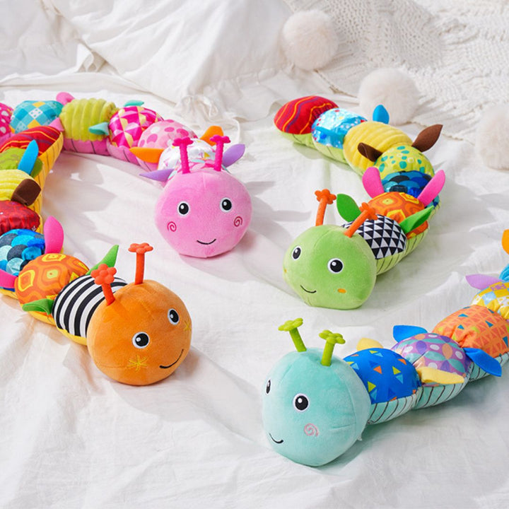 "Bunte Plüsch-Musikraupe für Babys, leuchtende Farben, weiche Texturen, Musikfunktion, fördert sensorische Entwicklung"