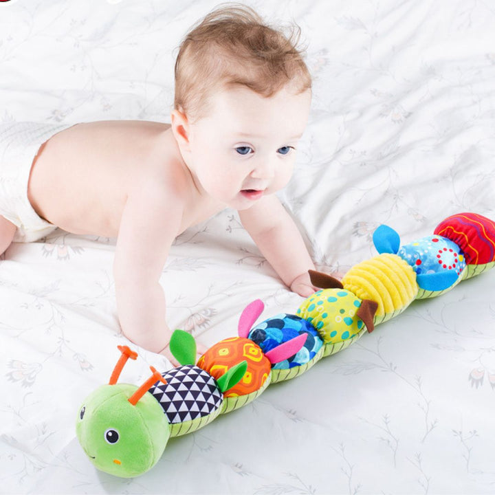 "Bunte Plüsch-Musikraupe für Babys, leuchtende Farben, weiche Texturen, Musikfunktion, fördert sensorische Entwicklung"