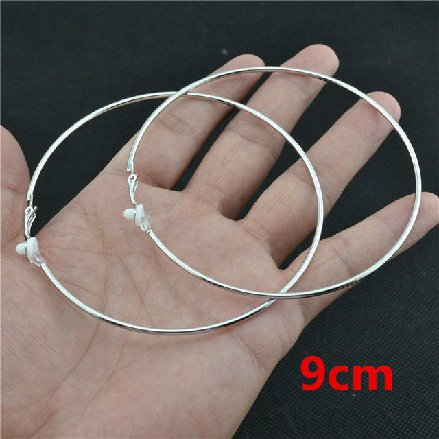 Silberne Creolen, 9 cm, ohne Ohrloch, klassischer Schmuck, modischer Ohrschmuck.