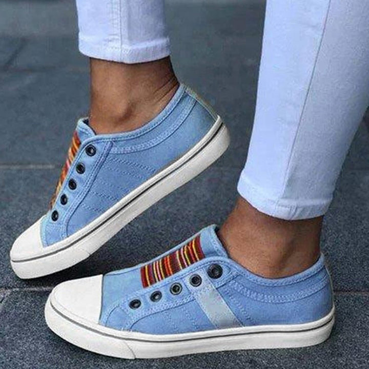 "Damen-Sneaker in Blau, atmungsaktiv und bequem, mit stoßdämpfender Sohle, ideal für Frühling und Outdoor-Aktivitäten."