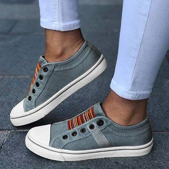 "Damen-Sneaker in Blau, atmungsaktiv und bequem, mit stoßdämpfender Sohle, ideal für Frühling und Outdoor-Aktivitäten."