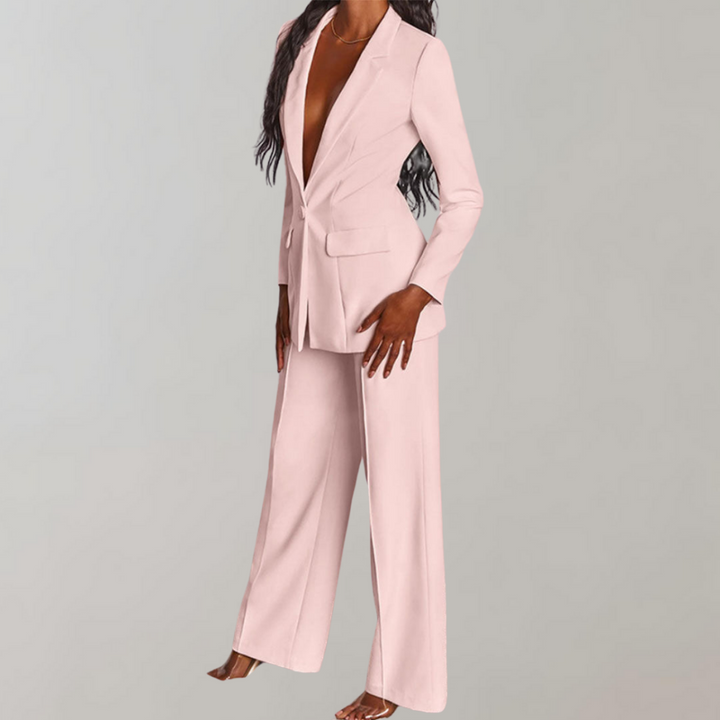 Damenanzug rosa, zweiteilig, Blazer und Hose, elegantes Design, Businessmode.