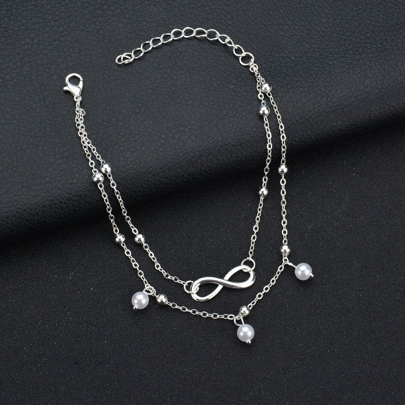Silbernes Armband mit Unendlichkeitssymbol, Perlenanhänger, verstellbar, Damen-Schmuck.