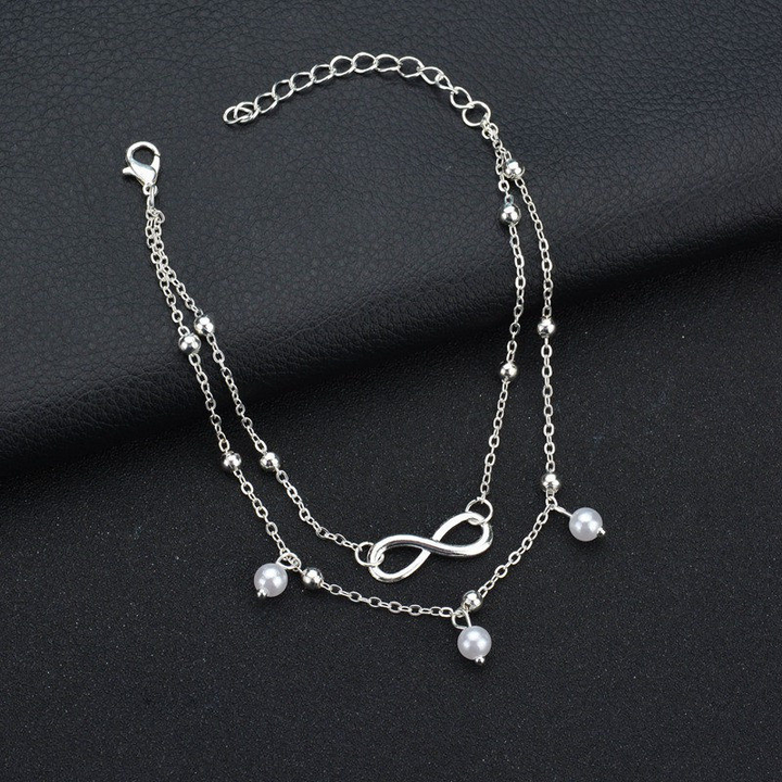 Silbernes Armband mit Unendlichkeitssymbol, Perlenanhänger, verstellbar, Damen-Schmuck.