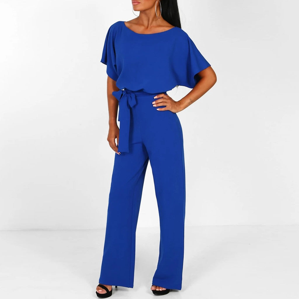 "Dunkelblauer Damen-Jumpsuit mit weiter Silhouette, gebundener Taille und eleganter Optik, passend für Events"