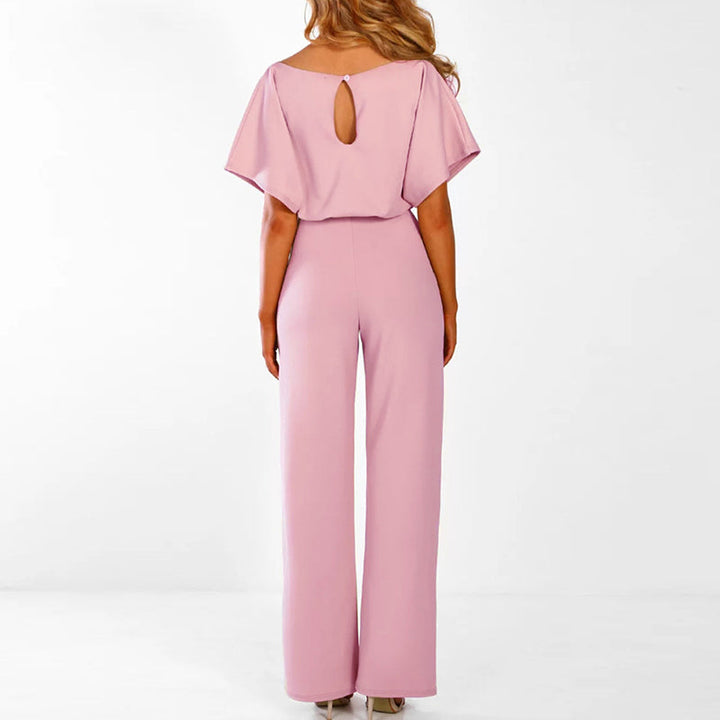"Dunkelblauer Damen-Jumpsuit mit weiter Silhouette, gebundener Taille und eleganter Optik, passend für Events"