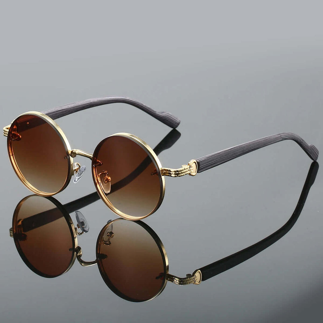 Klassische runde Sonnenbrille mit goldenen Details