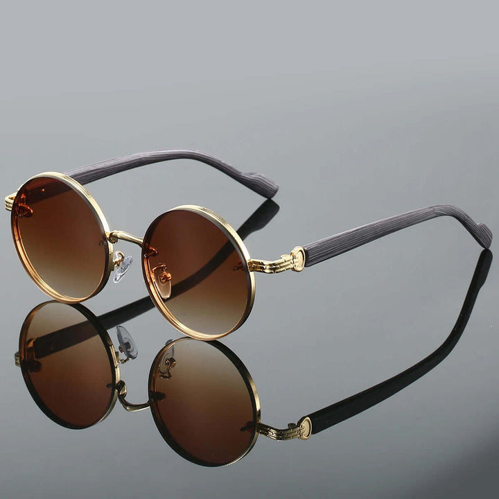 Klassische runde Sonnenbrille mit goldenen Details