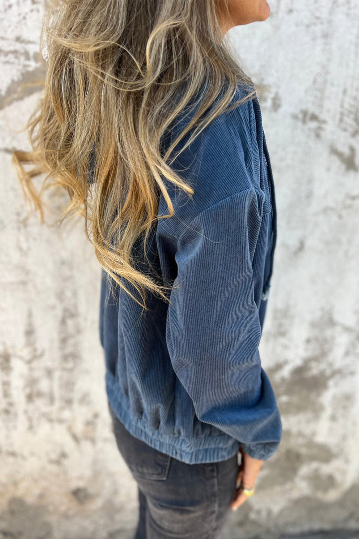 Blaugrüne Cordjacke mit Kapuze und Kordelzug