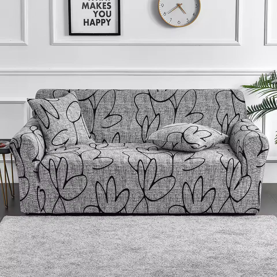 Elastische Sofahusse aus Spandex, modern und flexibel, in elegantem Blumendesign, schützt das Sofa vor Flecken und Abnutzung.