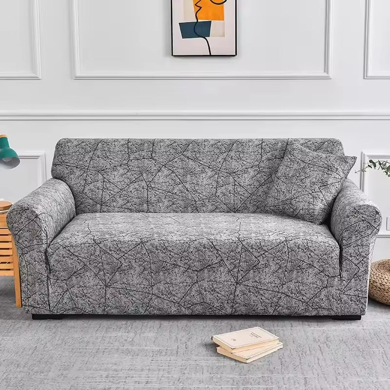 Elastische Sofahusse aus Spandex, modern und flexibel, in elegantem Blumendesign, schützt das Sofa vor Flecken und Abnutzung.