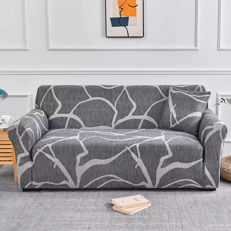 Elastische Sofahusse aus Spandex, modern und flexibel, in elegantem Blumendesign, schützt das Sofa vor Flecken und Abnutzung.