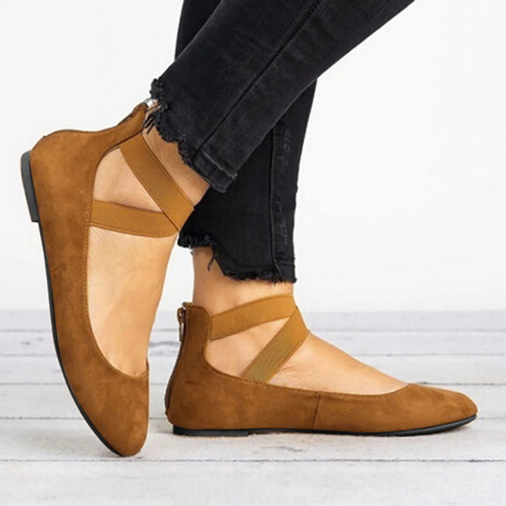 Elegante cremefarbene orthopädische Ballerinas mit elastischem Riemen, ideal für Komfort und stilbewusste Frauen.