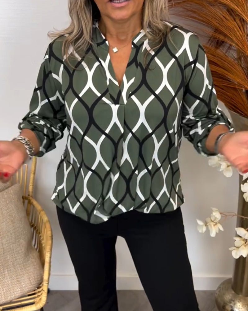 "Elegante Damenbluse mit geometrischem Muster, leichter Stoff, vielseitig für Anlässe, modernes Design, hoher Tragekomfort."