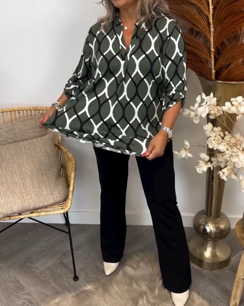"Elegante Damenbluse mit geometrischem Muster, leichter Stoff, vielseitig für Anlässe, modernes Design, hoher Tragekomfort."
