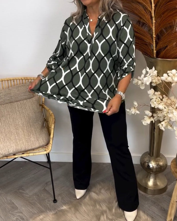 "Elegante Damenbluse mit geometrischem Muster, leichter Stoff, vielseitig für Anlässe, modernes Design, hoher Tragekomfort."