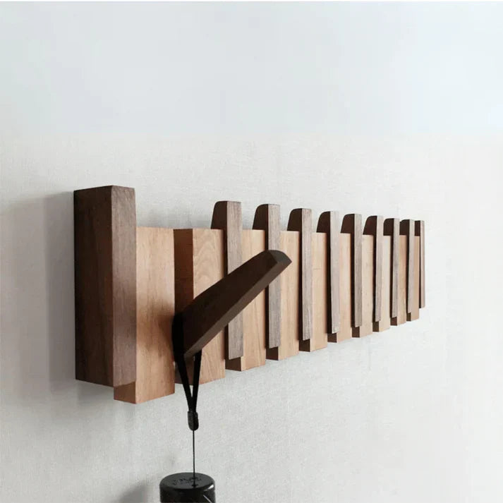 "Elegante Klavier-Wandgarderobe aus Holz mit kreativen Haken für stilvolle Aufbewahrung in deinem Zuhause"