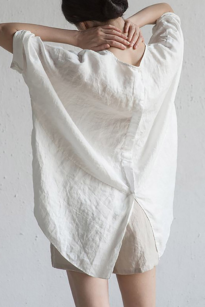 "Elegante Leinen-Strickjacke mit halben Ärmeln und Rundhals, leicht und atmungsaktiv, ideal für Sommer- und Übergangszeit."