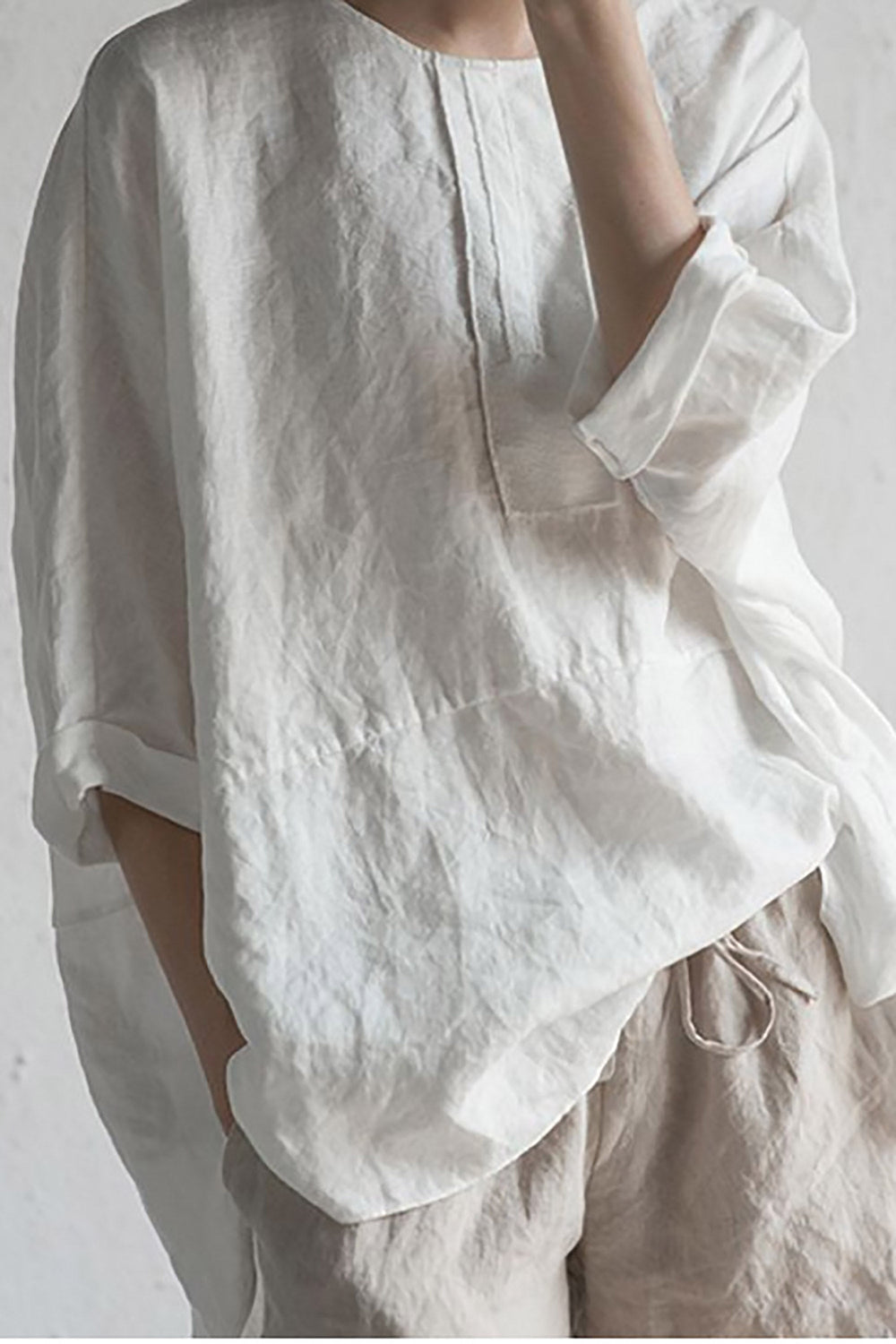 "Elegante Leinen-Strickjacke mit halben Ärmeln und Rundhals, leicht und atmungsaktiv, ideal für Sommer- und Übergangszeit."