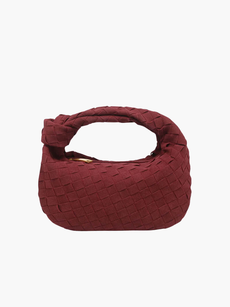 "Elegante Mini-Wildledertasche mit Woven Knot-Design und goldenen Akzenten, ideal für stilvolle Outfits."