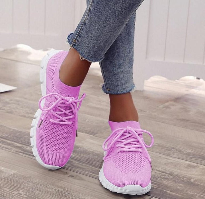Elegante orthopädische Damen-Sneakers in Rosa für gesunde Fußhaltung, ergonomisches Design, vielseitiger Stil.