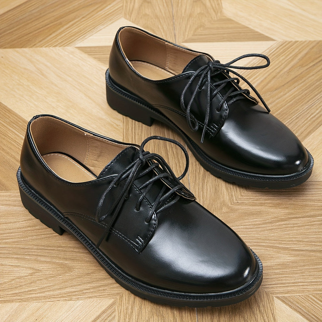 "Elegante schwarze orthopädische Damenschnürschuhe, ergonomisches Design, rutschfeste Sohle, vielseitig einsetzbar."