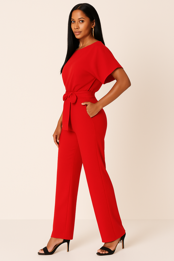 Eleganter Damen-Jumpsuit mit verstellbarem Krawatten-Gürtel und fließendem Stoff für stilvolle Anlässe und Freizeit.