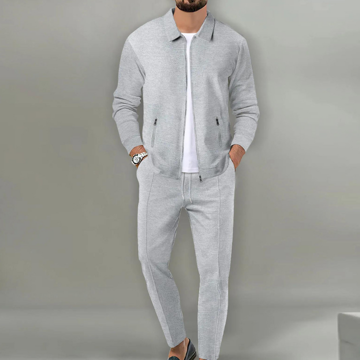 "Eleganter Freizeitanzug für Damen, klassisches Design, zeitlos, helle Farbe, hochwertige Passform für vielseitige Anlässe."