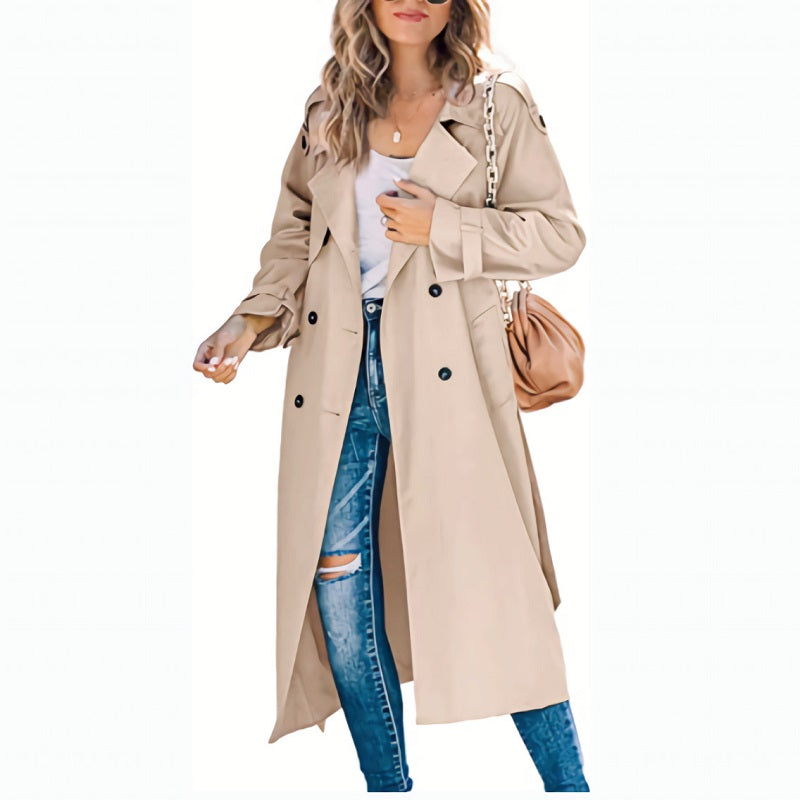 Eleganter grauer Langschaft-Trenchcoat für Damen mit klassischer Knopfleiste und figurschmeichelnder Silhouette.