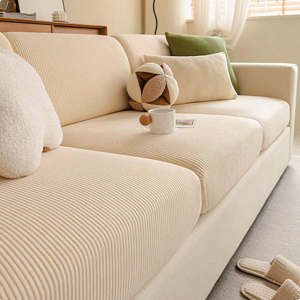 Eleganter kratzfester Cord-Sofabezug mit Jacquard-Streifen, elastisch und rutschfest, maschinenwaschbar für einfachen Schutz.