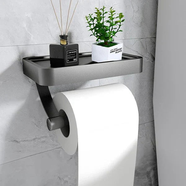 "Eleganter Toilettenpapierhalter mit integrierter Ablage aus gebürstetem Edelstahl, ideal für moderne Badezimmergestaltung."