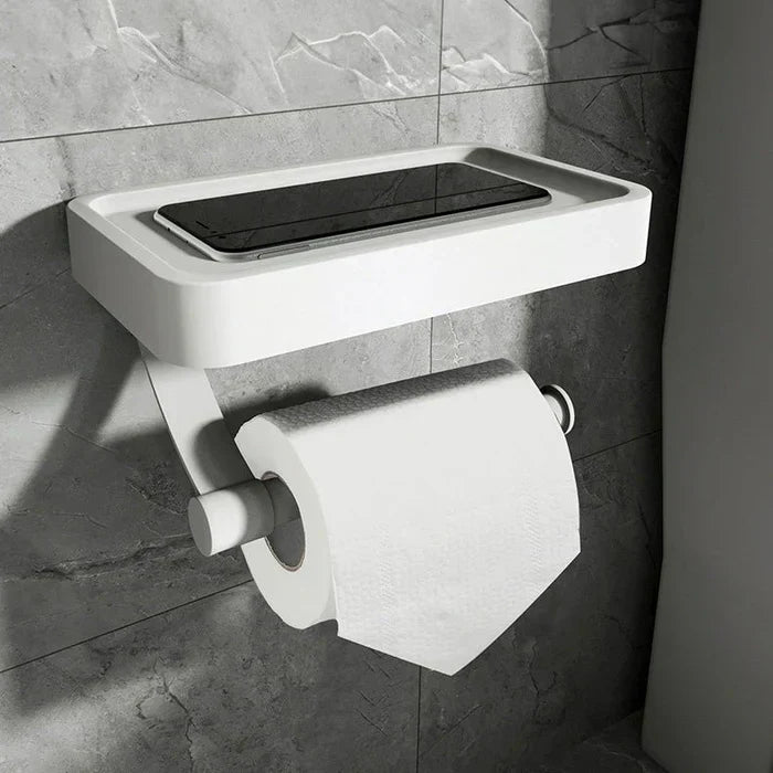 "Eleganter Toilettenpapierhalter mit integrierter Ablage aus gebürstetem Edelstahl, ideal für moderne Badezimmergestaltung."