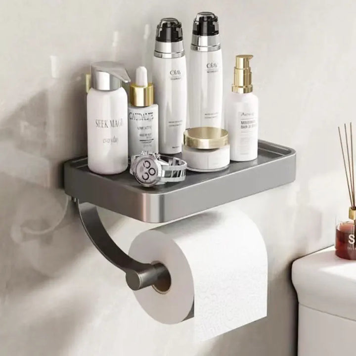 "Eleganter Toilettenpapierhalter mit integrierter Ablage aus gebürstetem Edelstahl, ideal für moderne Badezimmergestaltung."