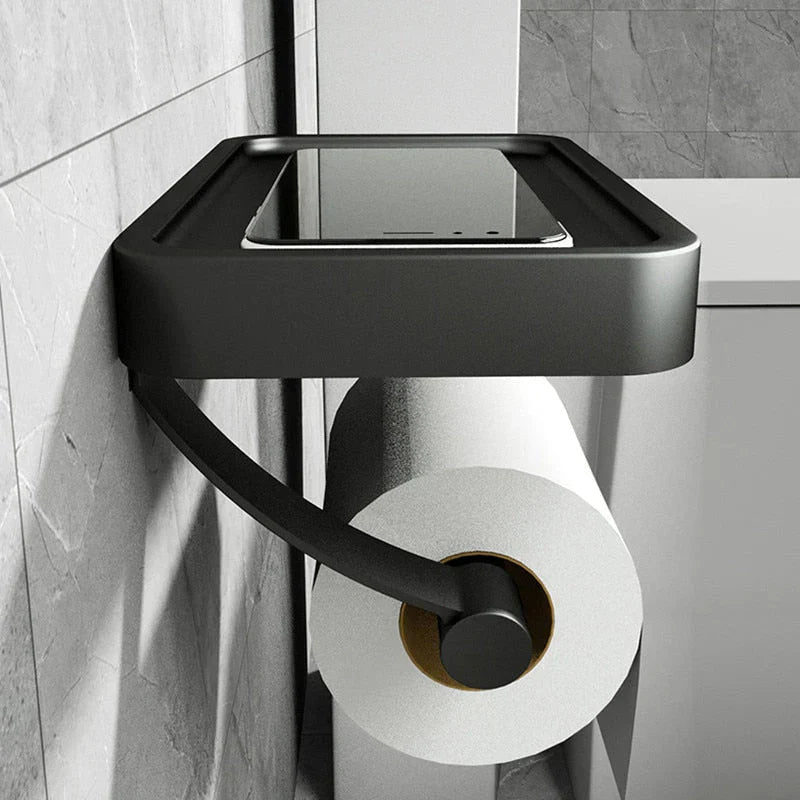 "Eleganter Toilettenpapierhalter mit integrierter Ablage aus gebürstetem Edelstahl, ideal für moderne Badezimmergestaltung."