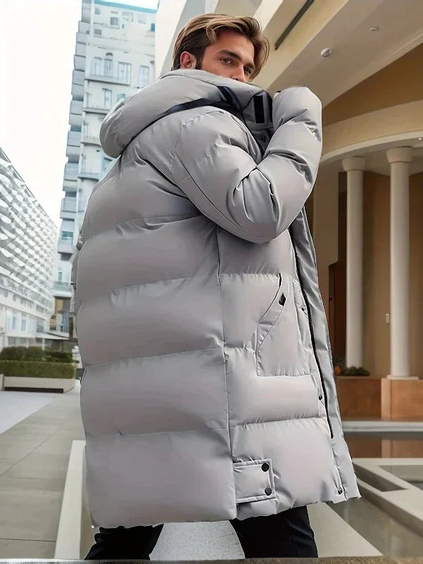 Eleganter, wasserdichter Herren Parka mit Kapuze in Dunkelblau, ideal für stilvollen Winterschutz. Perfekt für jedes Wetter.