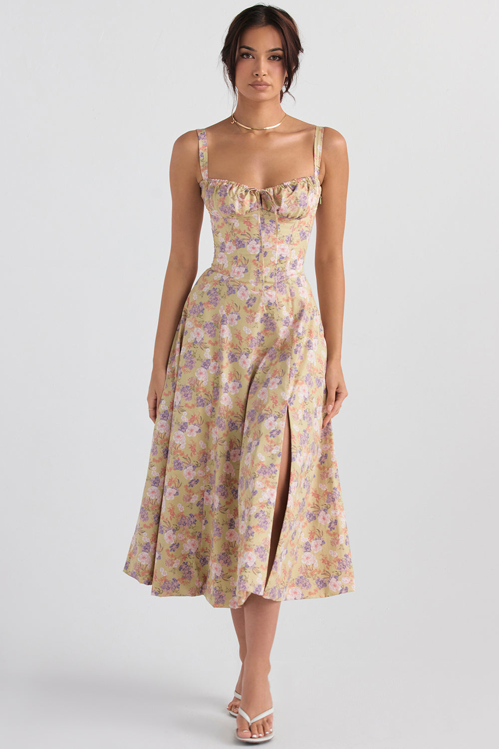 Elegantes Bustierkleid mit lebhaftem Blumenmuster, figurbetonender Schnitt, perfekt für Frühlingsanlässe.
